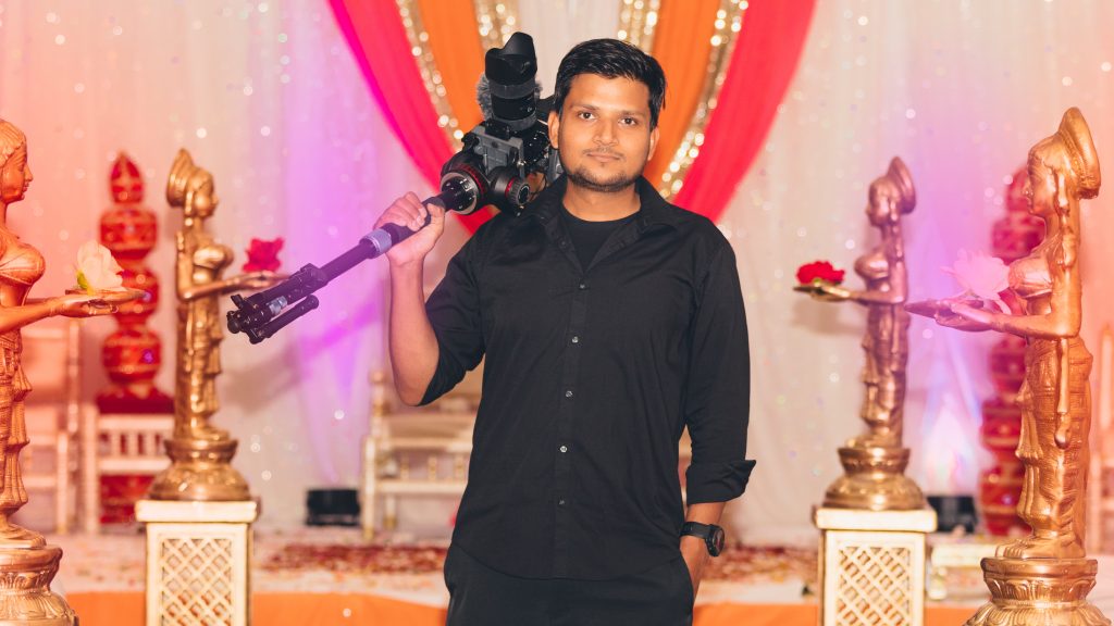 videographer at an Indian wedding waiting to start filming