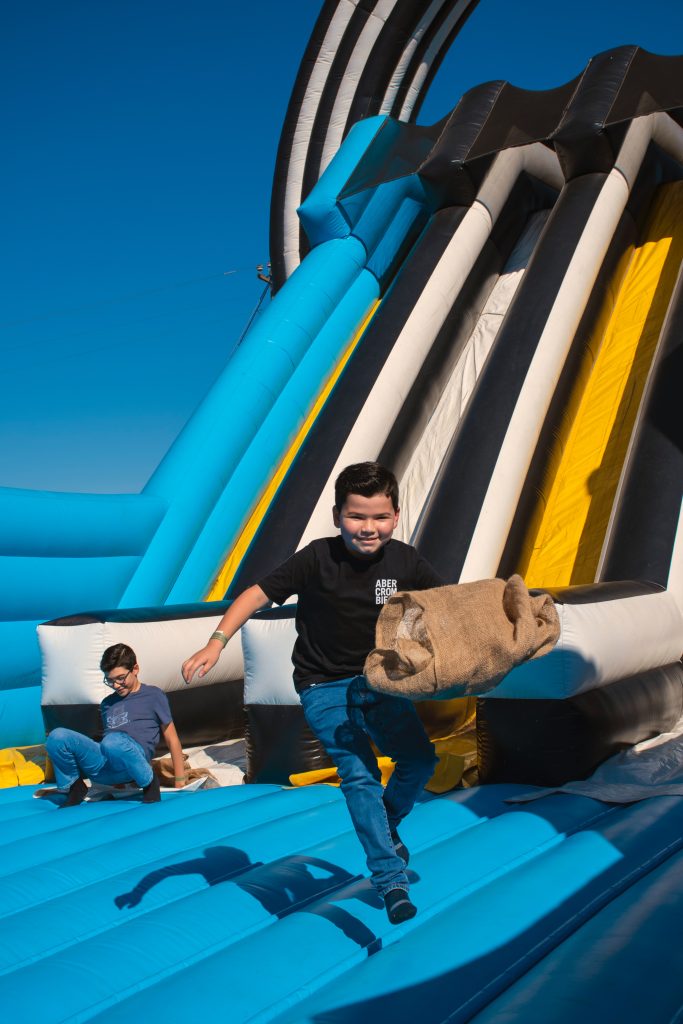 giant inflatable slide with boy on